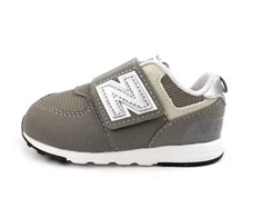 New Balance rain cloud/silver metallic 574 sneaker (bred)